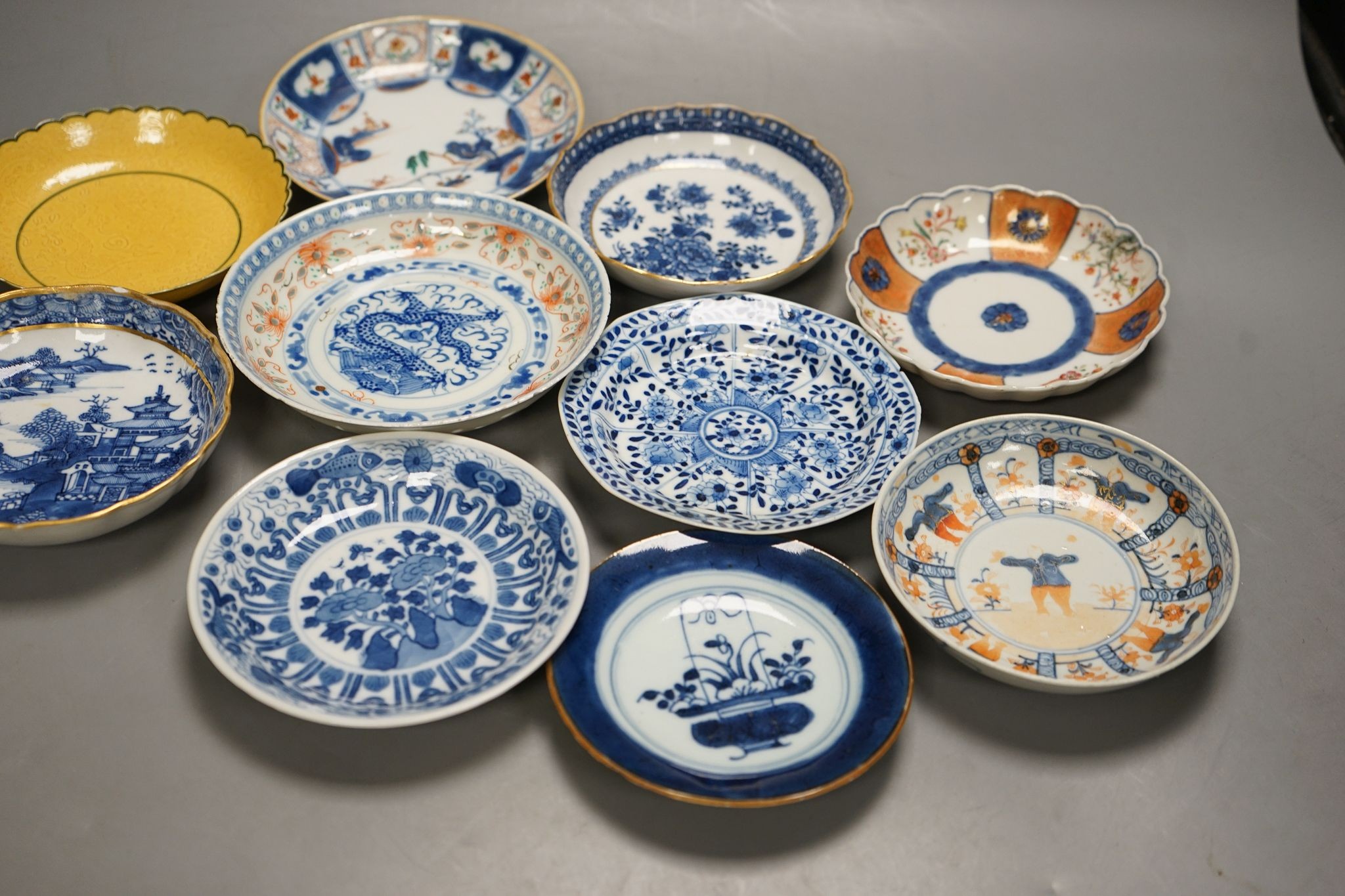 Ten various Chinese porcelain saucer dishes, largest 15cm